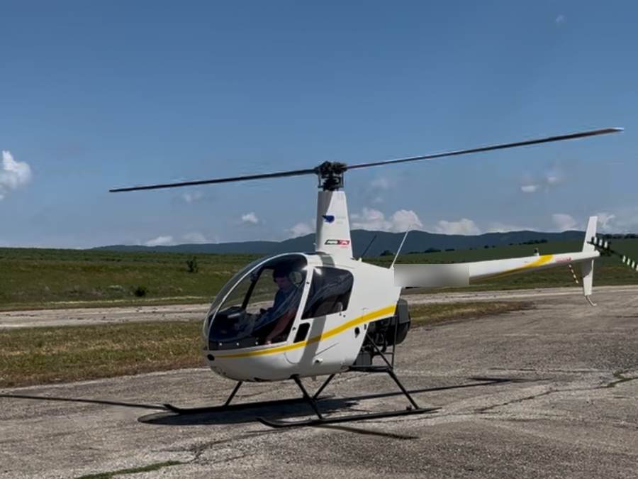 Хеликоптер Robinson R22 на перона